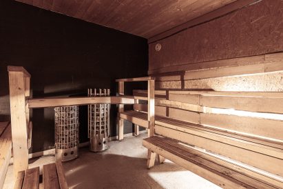 The spacious electric sauna compartment of Evo Grand Villa's ground floor.
