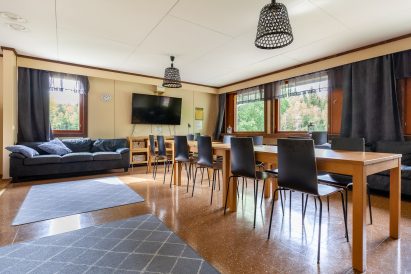 The spacious main hall of Evo Grand Villa is suitable for activities such as meetings, dining, and social gatherings.