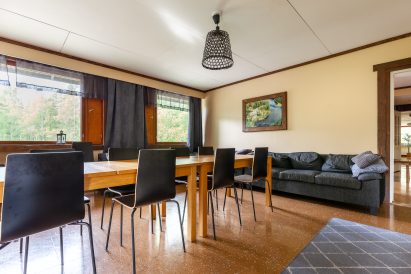 Around the main hall on the upper floor of Evo Grand Villa, there are several spacious seating groups.