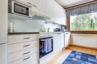 The fully equipped kitchen on the upper floor of Evo Grand Villa.