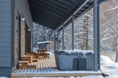 On the terrace of Aulanko Lake Villa, there is an outdoor jacuzzi designed for year-round use.