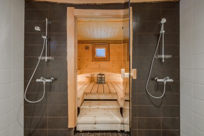 Aulanko Lake Villa's electric sauna and shower room.