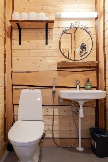 The toilet in the lobby area of Aulanko Lakeside's main villa.