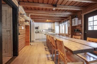 About 12 people can sit around the sturdy table in the main hall of Evo Wilderness Villa for meetings, meals or enjoying being together.