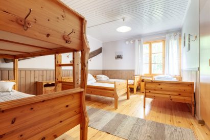 One of the spacious sleeping halls in the main building of Evo Ruuhijärvi.