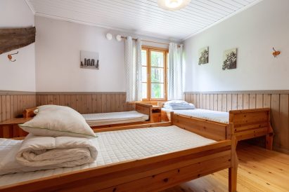 One of the spacious sleeping halls in the main building of Evo Ruuhijärvi.