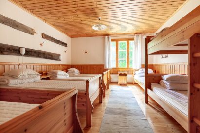 One of the spacious sleeping halls in the main building of Evo Ruuhijärvi.
