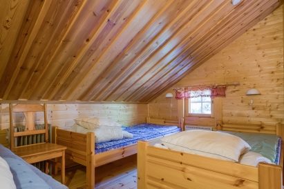 The upper loft of Evo Syväjärvi's accommodation cabin. Both cabins are decorated in the same way.