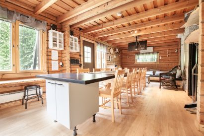 About 12 people can sit around the sturdy table in the main hall of Evo Wilderness Villa for meetings, meals or enjoying being together.