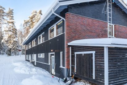 The woodshed for fireplaces, lakeside sauna, and hot tubs is located at the end of Evo Grand Villa.