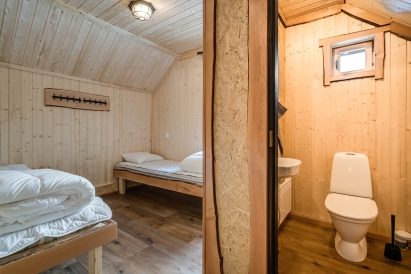The toilet and double bedroom on the 2nd floor of Tavastia Privacy.