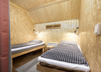 Two-person bedroom on the upper floor of Tavastia Privacy.