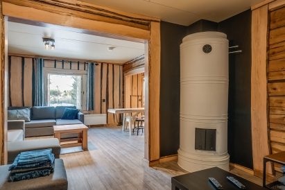 Adjacent to the main hall at Tavastia Privacy, there is a cozy cabin with a sofa that can also be used as a bed.