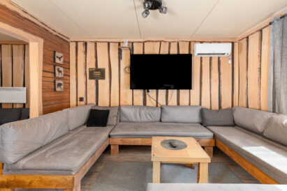 The living room at Tavastia Privacy is located at the back of the main hall. Next to the hall, there is a separate cozy cabin.