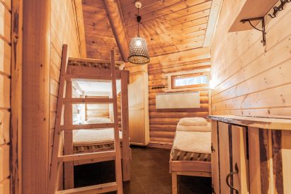 3-person bedroom of Loppi Wilderness Villa.