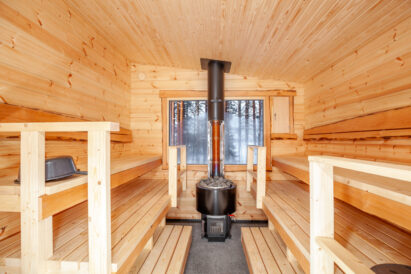 Sauna room of the wood-heated scenery sauna located in the yard of Loppi Luxus.