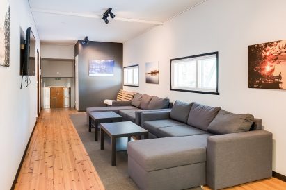 Next to the main hall of Räyskälä Grand Villa, there is a cozy lounge area with a television. Sofas can be used as additional beds if needed.