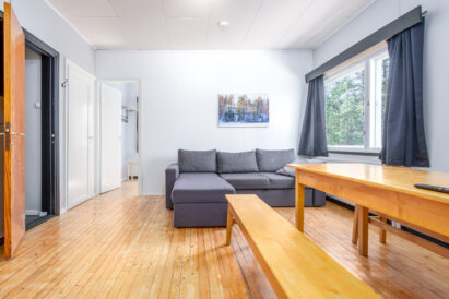 The living room of the west wing corner apartment at Räyskälä Grand Villa. The apartment is available for rent at an additional cost or separately.