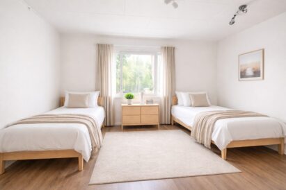 Tekoälyllä tuotettu havainnekuva Räyskälän Kattohuoneiston pienen huoneiston makuuhuoneesta.